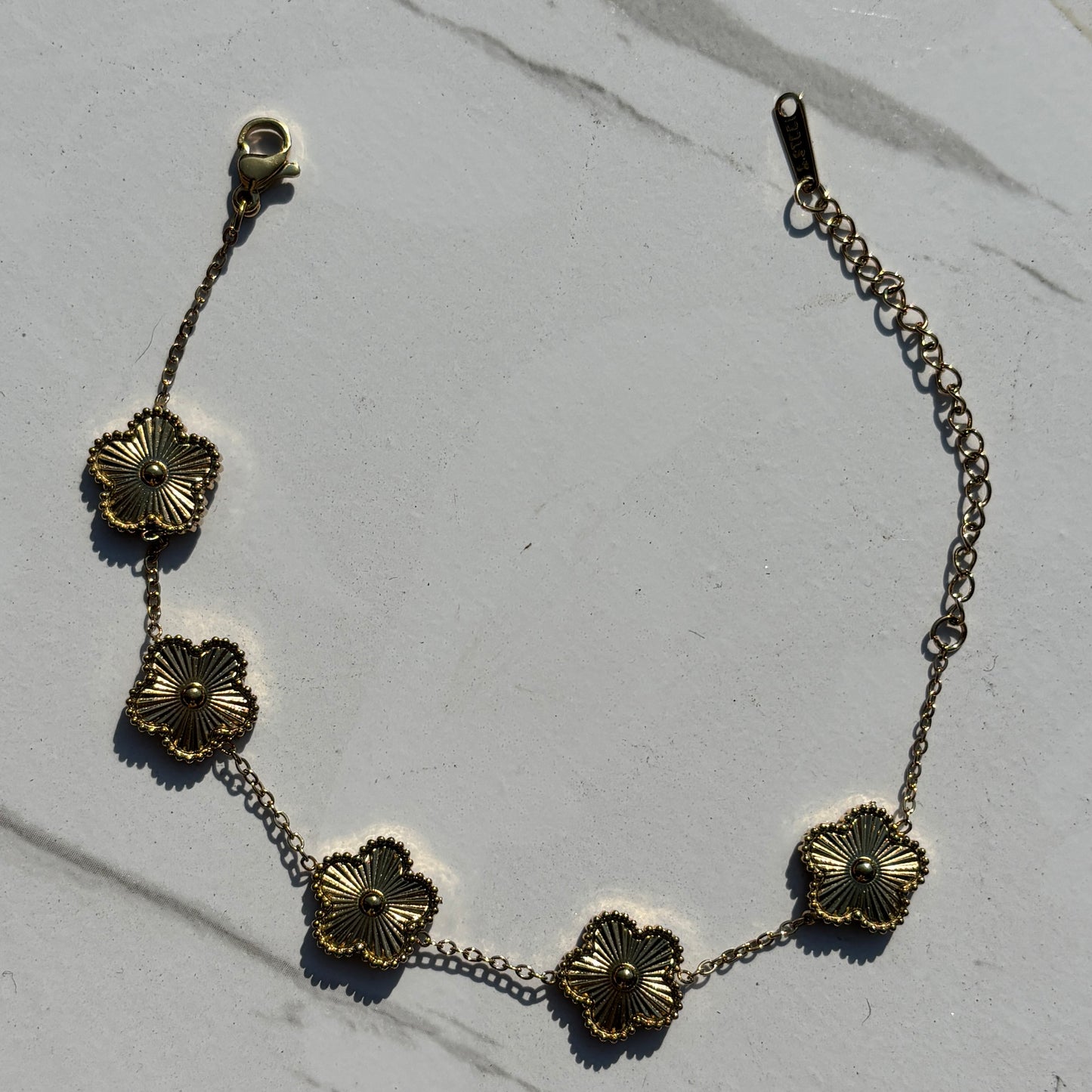 Gold clove bracelet